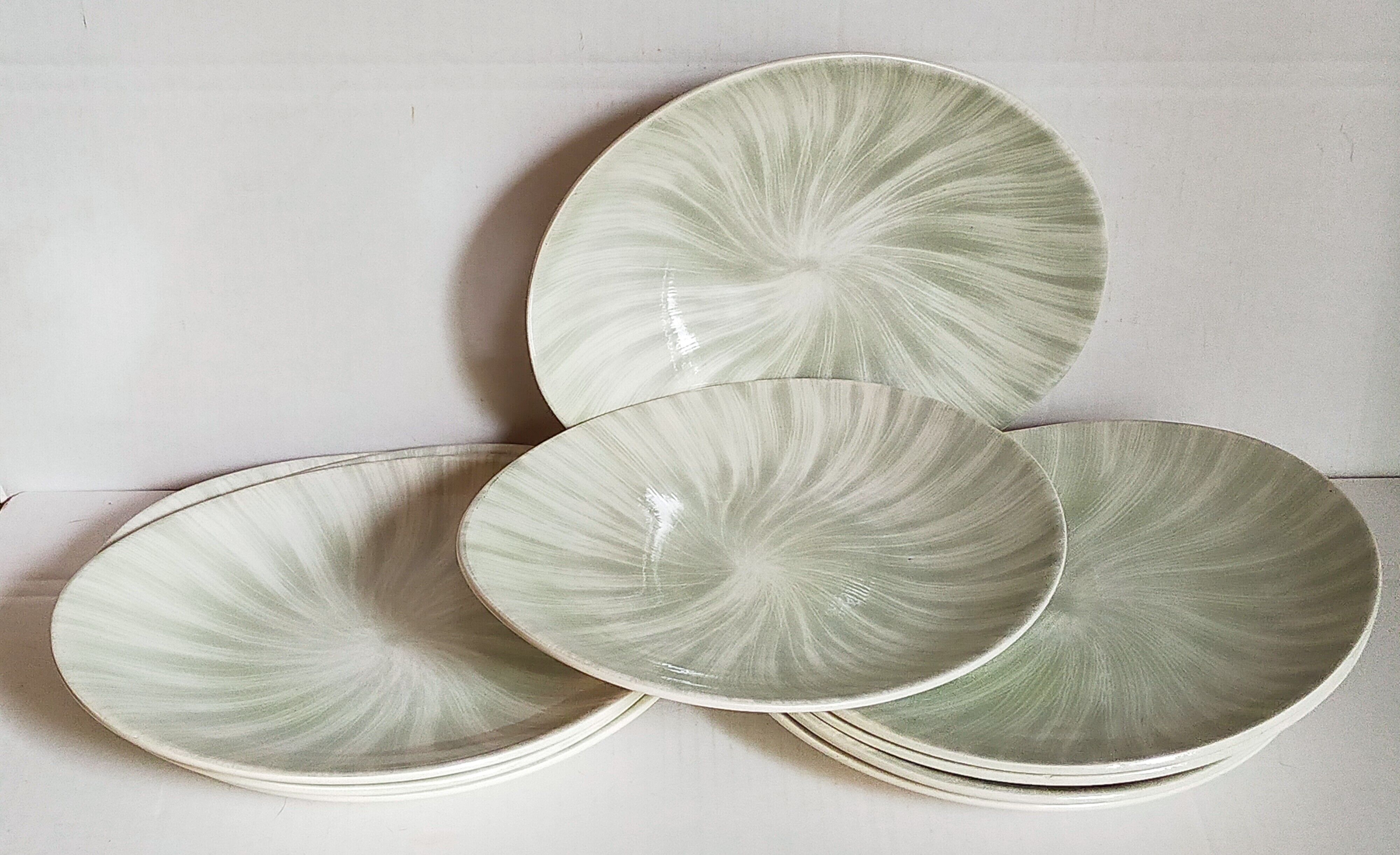 Nine earthenware plates from Salins-les-Bains vintage