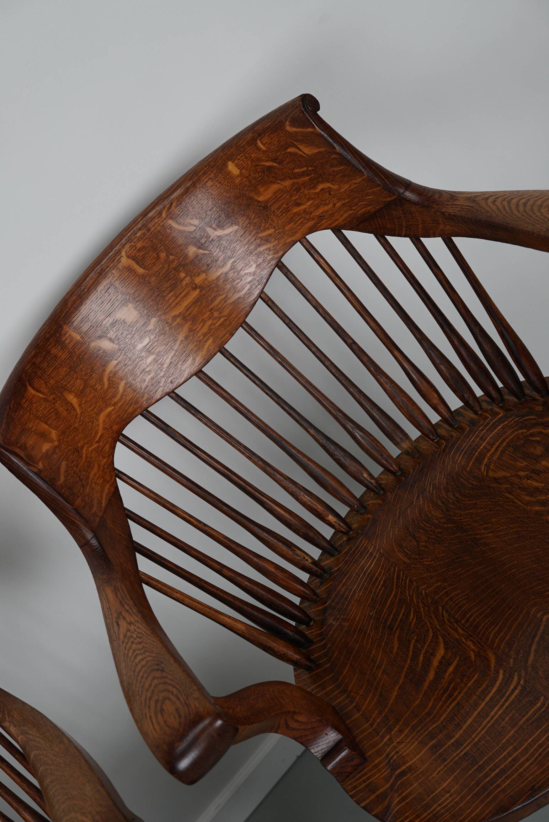 Pair of English Edwardian Oak Spindle Back Captains Office Desk Chairs