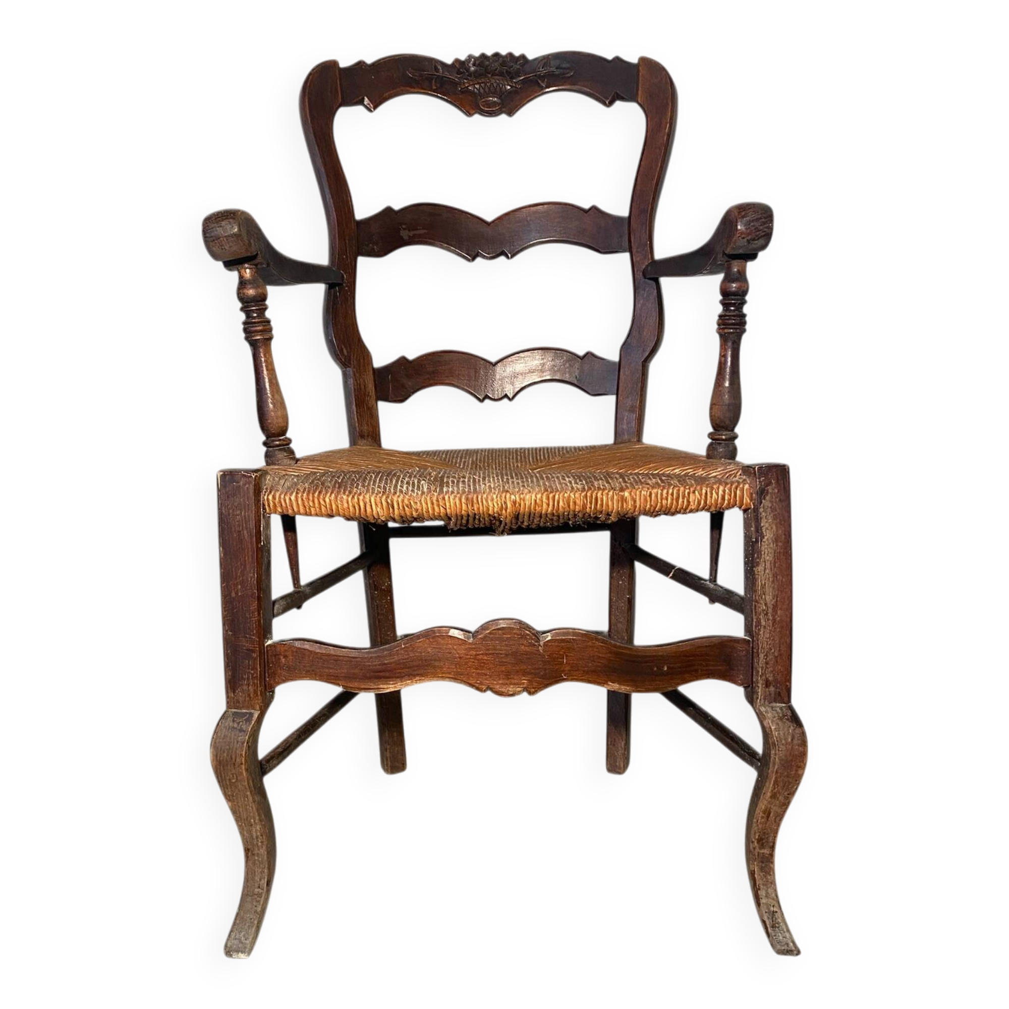 Antique Provencal armchair in carved wood with straw seat