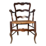Fauteuil provençal ancien en bois sculpté avec assise en paille