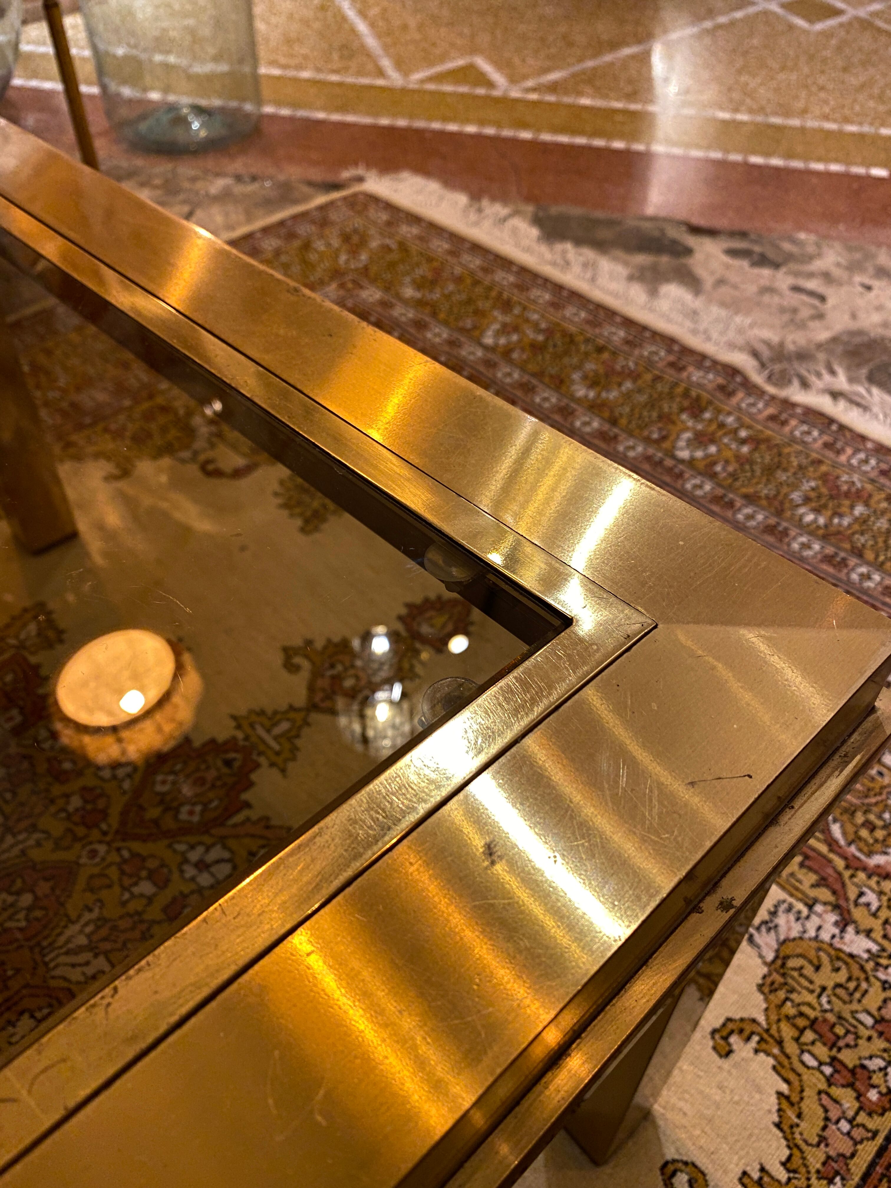 Gold square coffee table and smoked glass
