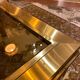 Gold square coffee table and smoked glass