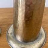 Pair of hammered metal candlesticks