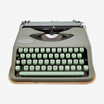Machine à écrire hermes baby rocket vert tilleul avec sa valise marron révisée ruban neuf