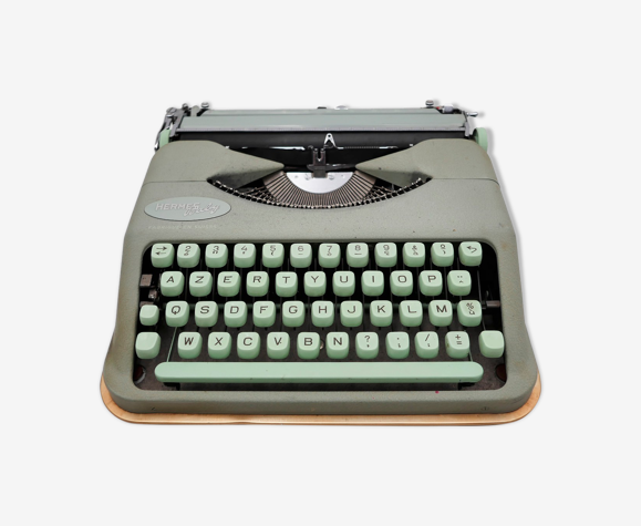 Machine à écrire hermes baby rocket vert tilleul avec sa valise marron révisée ruban neuf