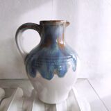 Small ceramic pitcher decorated with grapes