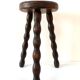 Old tripod stool in solid wood