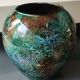 Large signed Line Lacquered Ball Vase. Made of églomisé glass. Dimensions: 18 x 16 cm