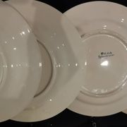 4 assiettes plates en terre de fer modèle OKAN de Longchamp