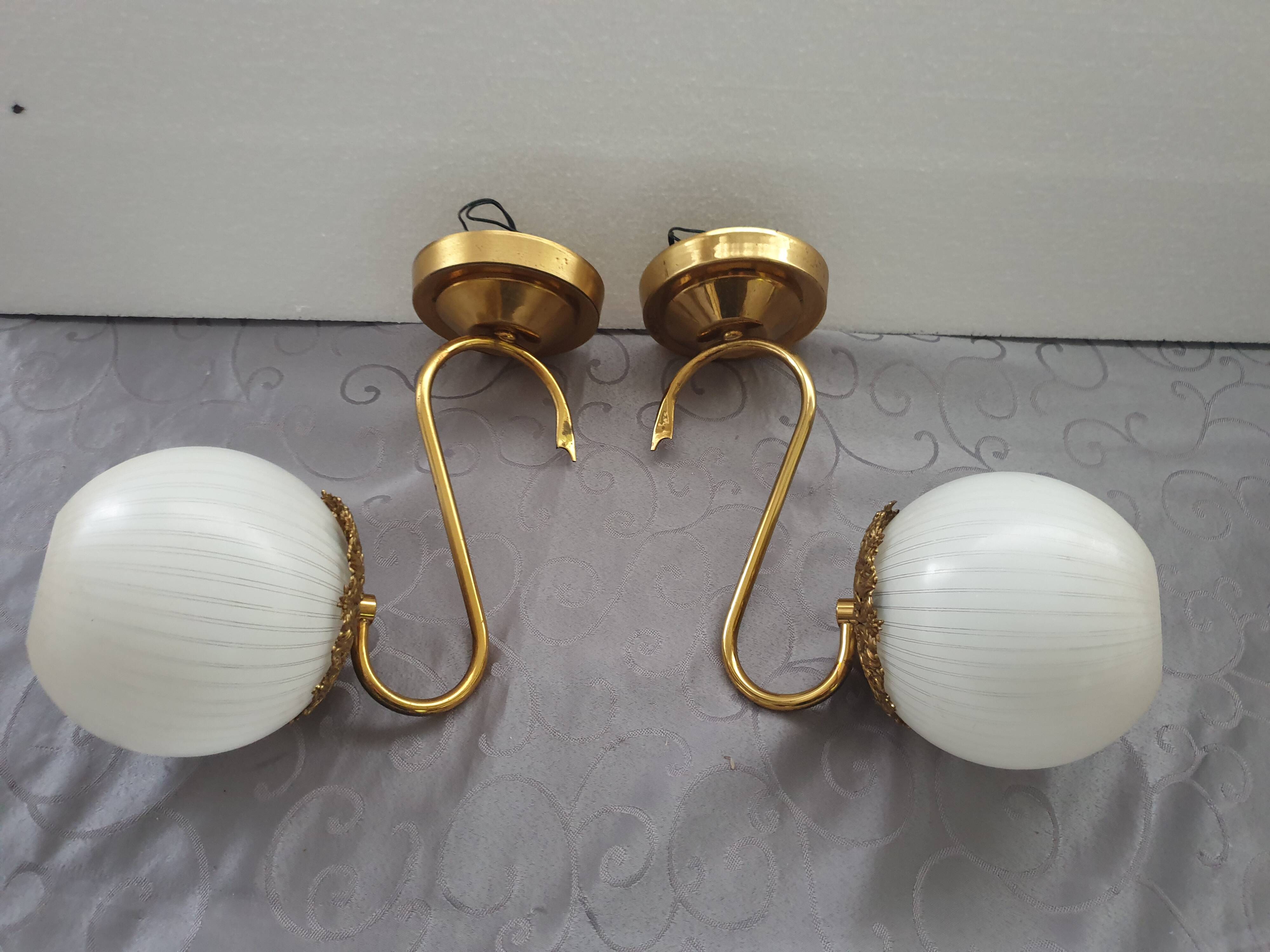 Pair of brass and glass wall lights