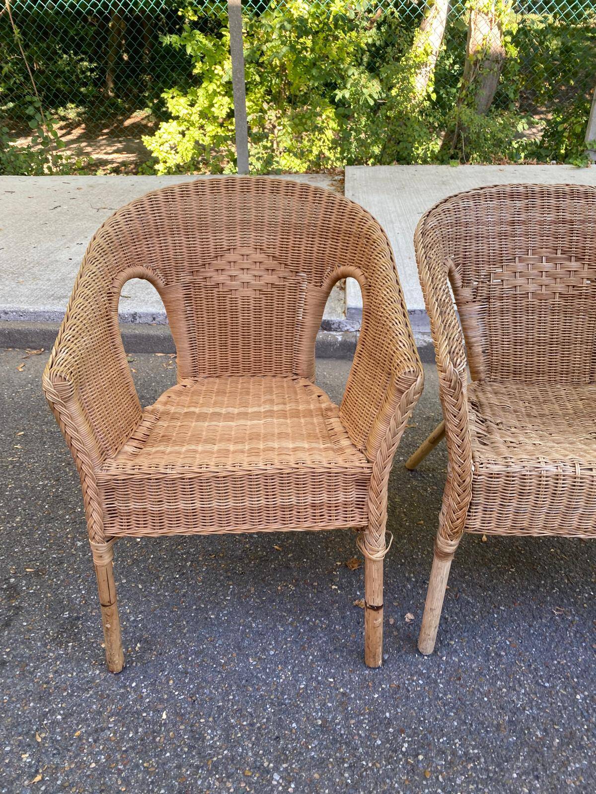 Rattan and woven wicker armchair in vintage bohemian style