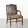 Wooden cow leather English Gainsborough chair with a stunning appearance