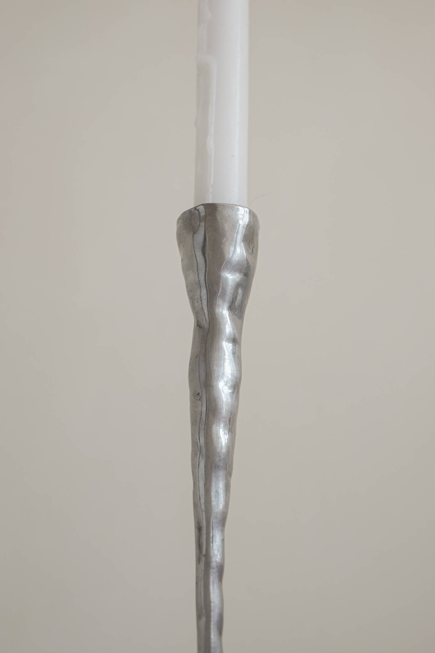 Pair of aluminium candle holders