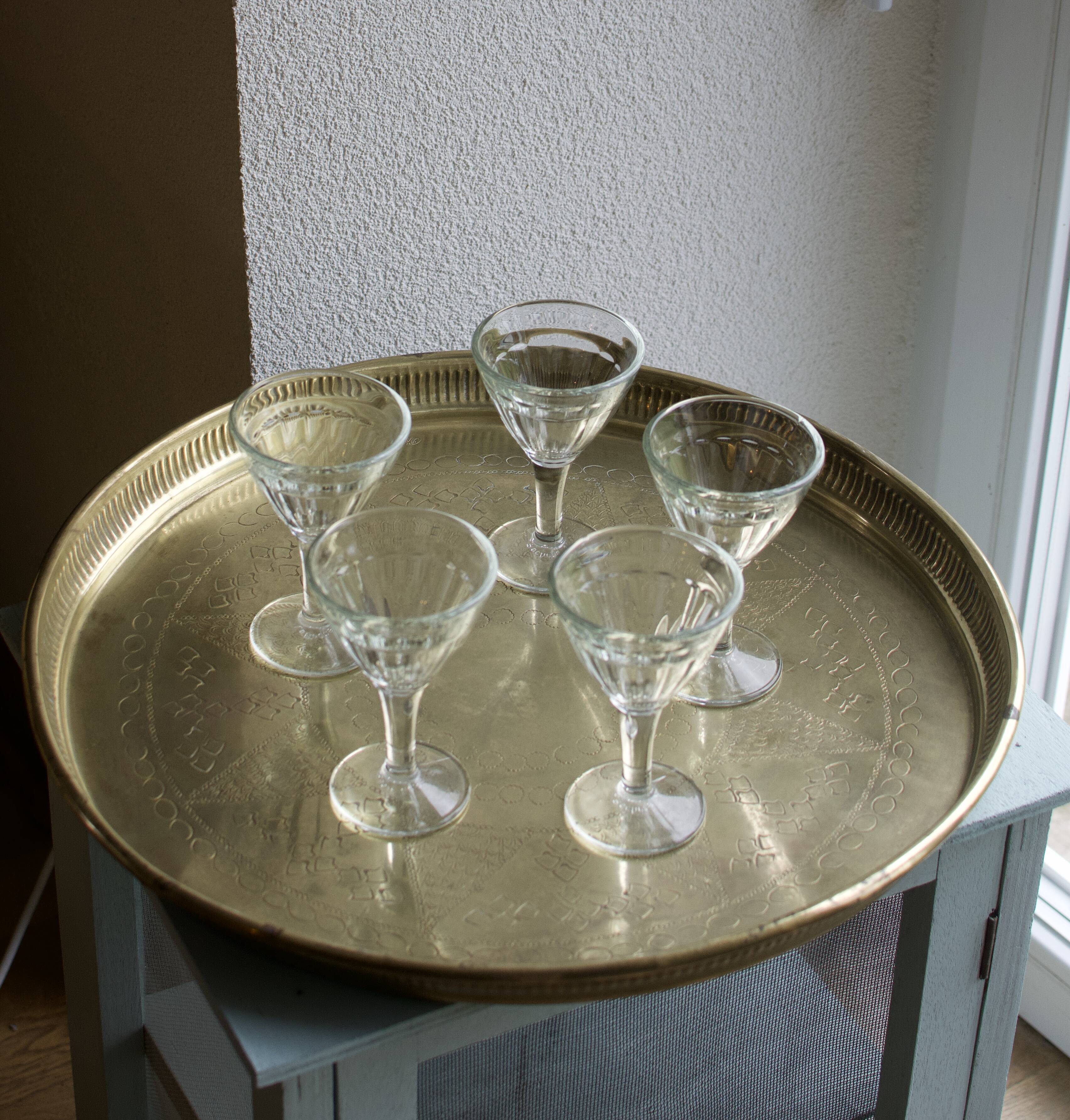 Golden service tray in vintage brass