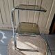 Side table, end table, bedside table in chrome metal with tempered glass.