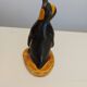 Small plaster penguin statue