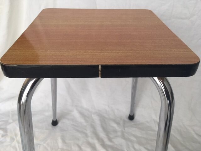 Stool in orange/brown formica