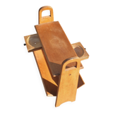 Magazine rack with sliding drawers in light wood, Scandinavian style.