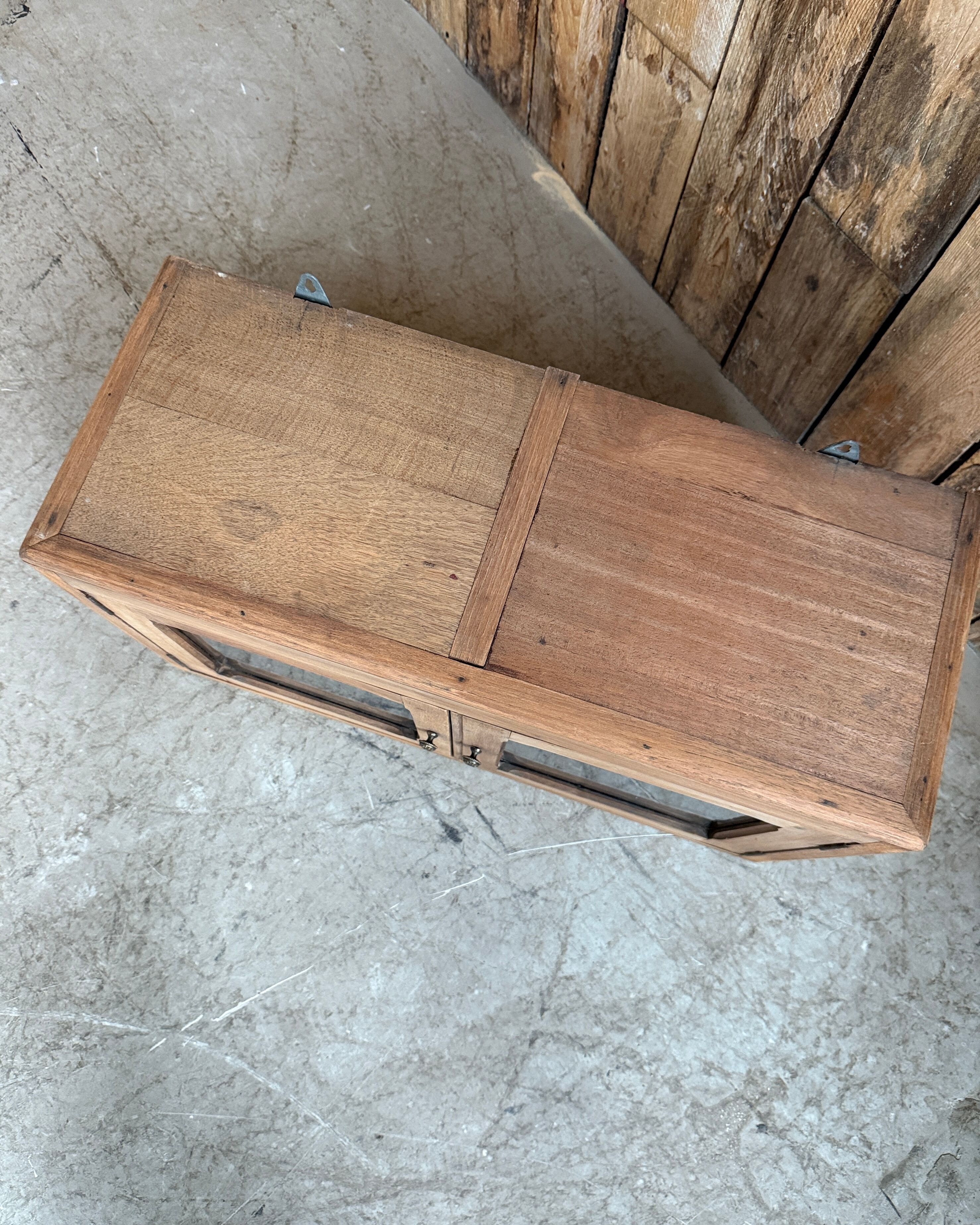 Small antique wall display cabinet in walnut.