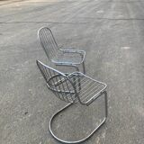 Two Gastone Rinaldi style chrome metal chairs.
