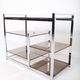 Vintage hifi or TV unit in chrome steel and smoked glass