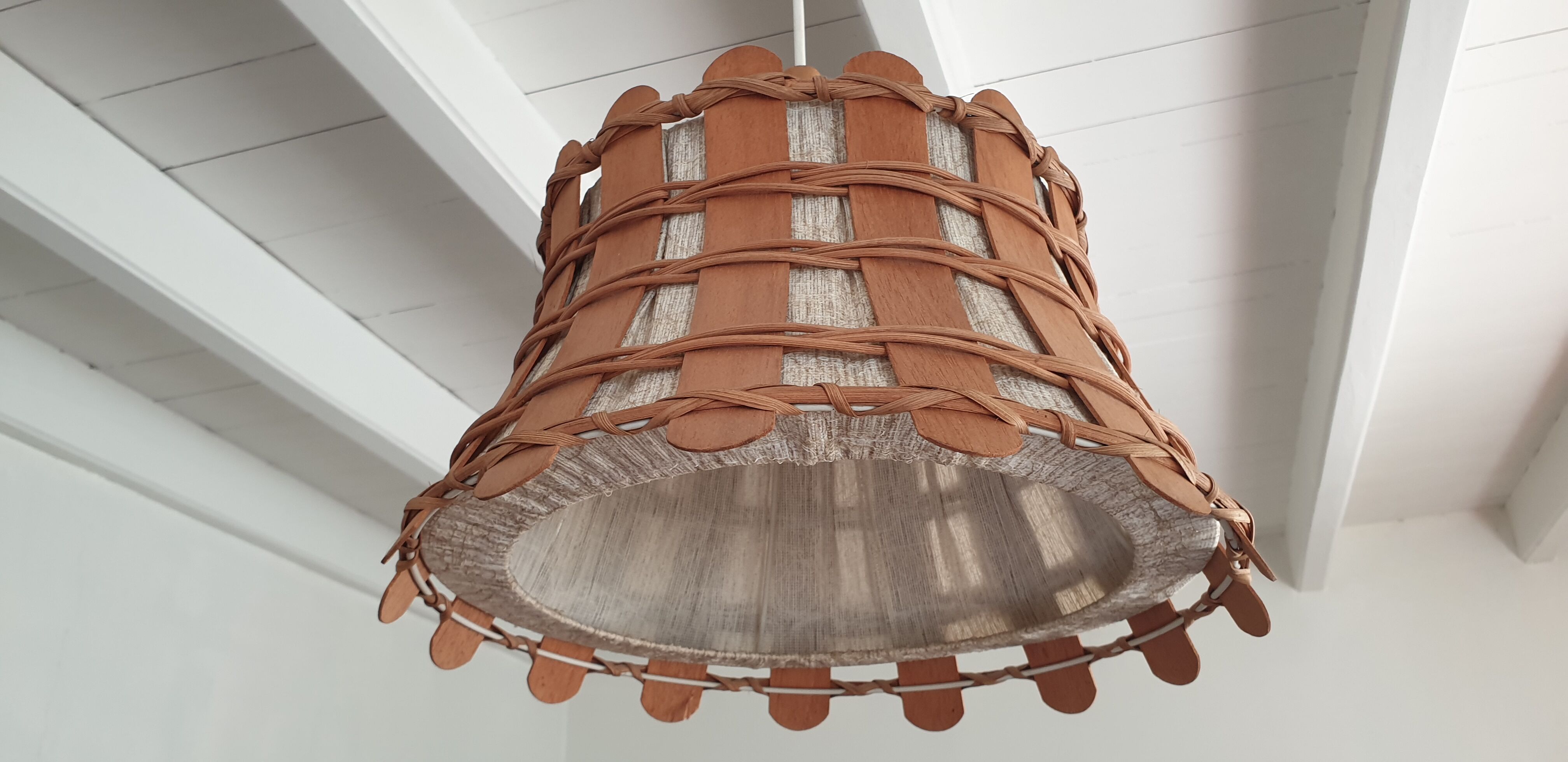 Rattan and wood suspension