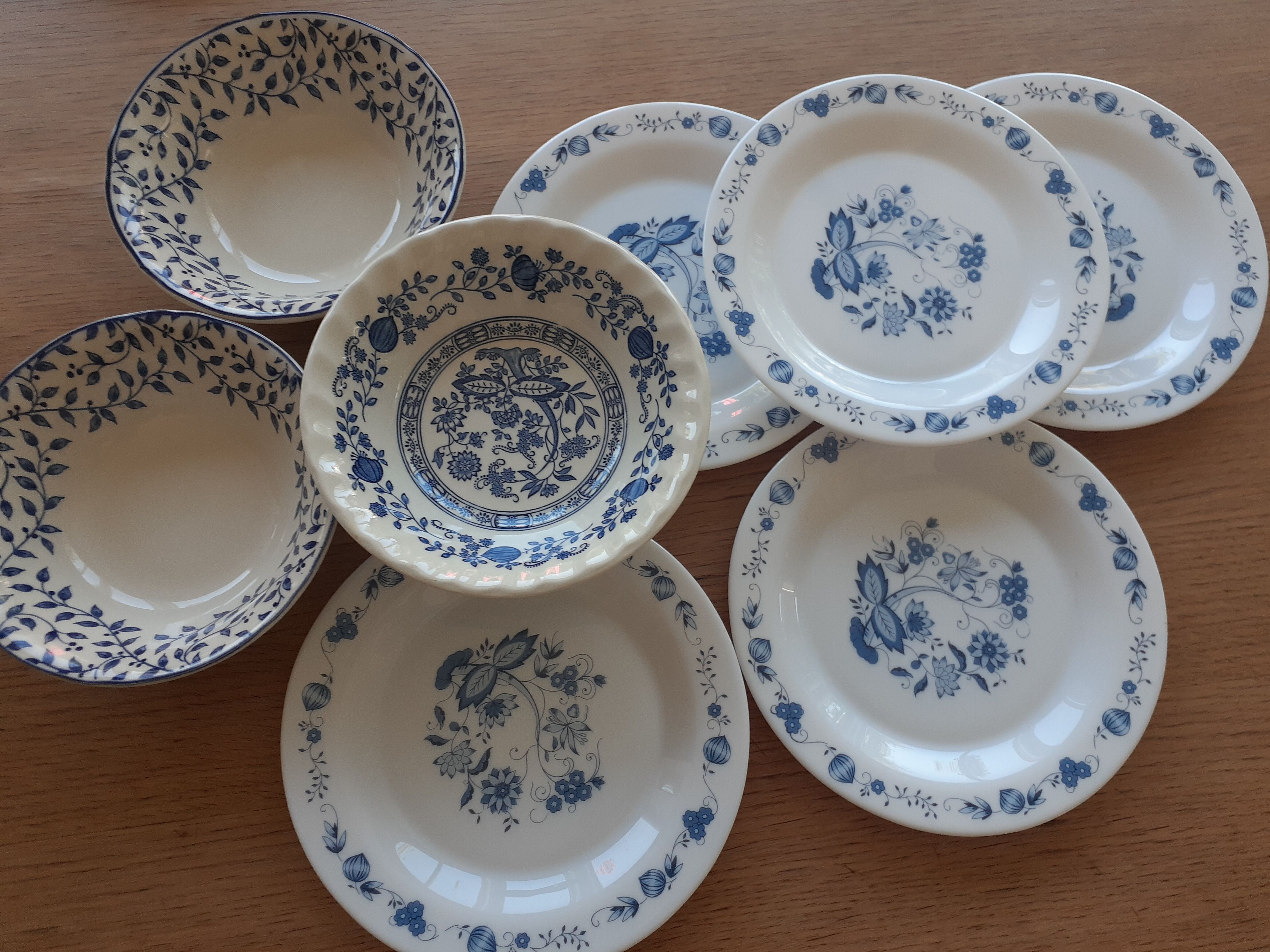 3 bowls and 5 blue plates