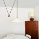Large Adjustable Brass Pendant Lamp with Counterweight by Florian Schulz