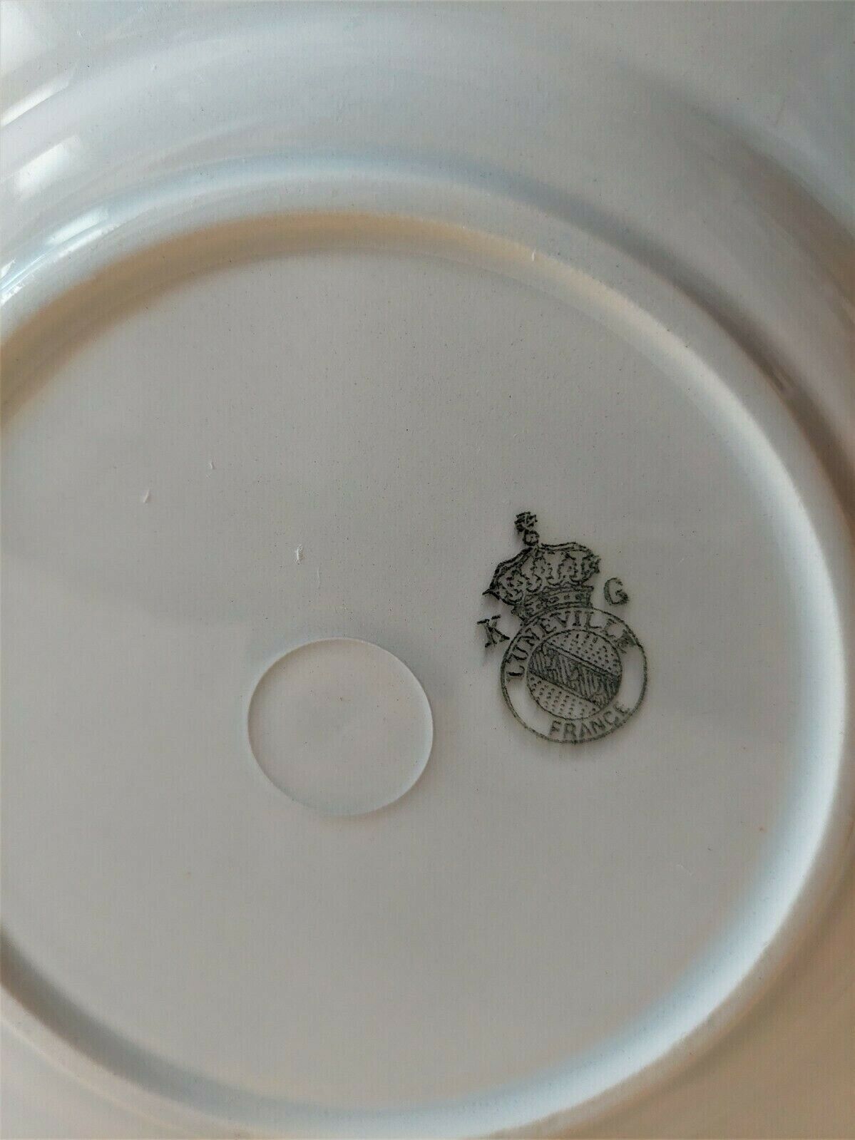 Series of six Lunéville KG earthenware dessert plates