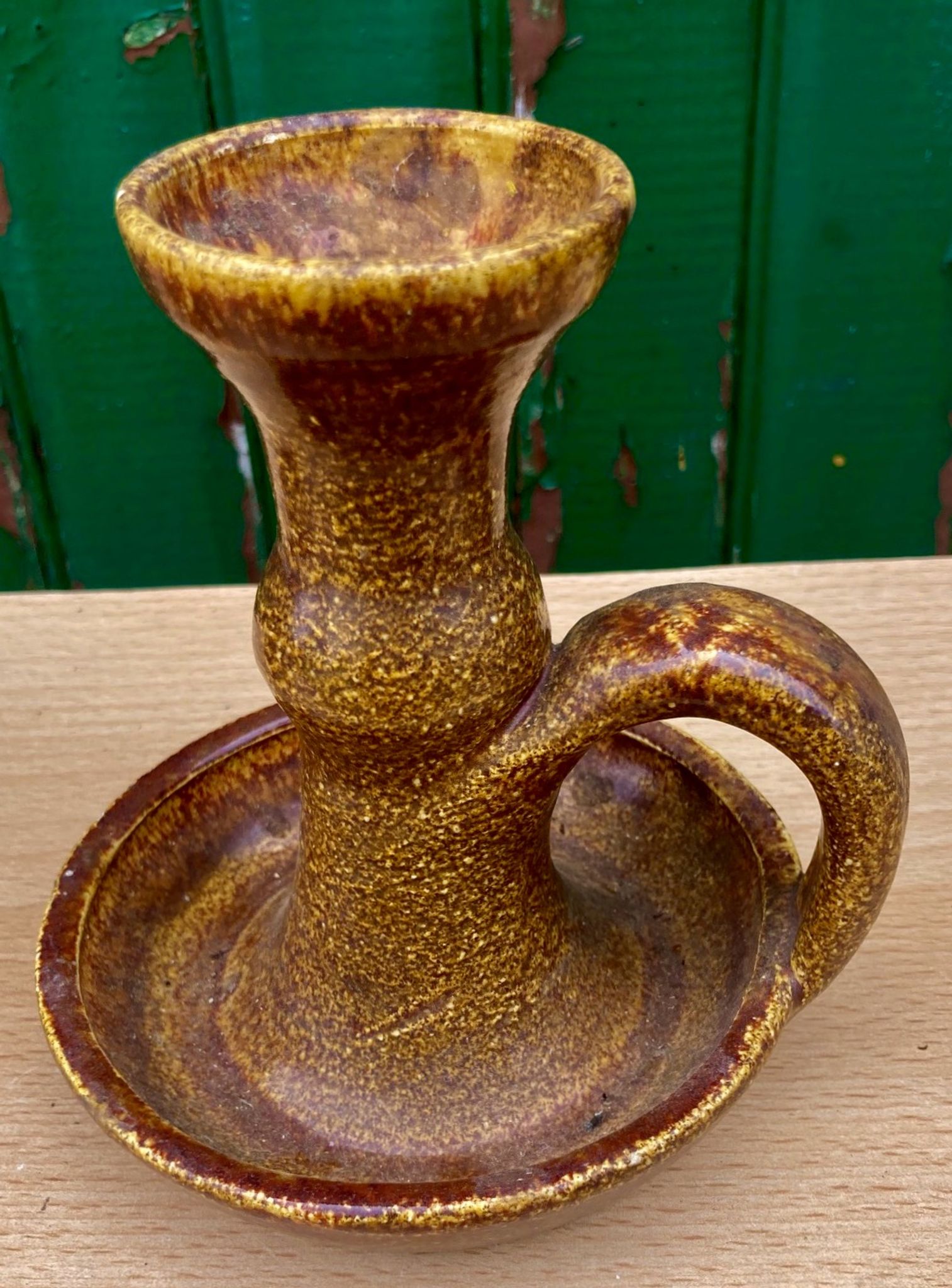 Candle holder in old earthenware signed by the 2 glued aa of the Accolay factory