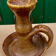 Candle holder in old earthenware signed by the 2 glued aa of the Accolay factory