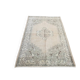 Small bige vintage floral rug