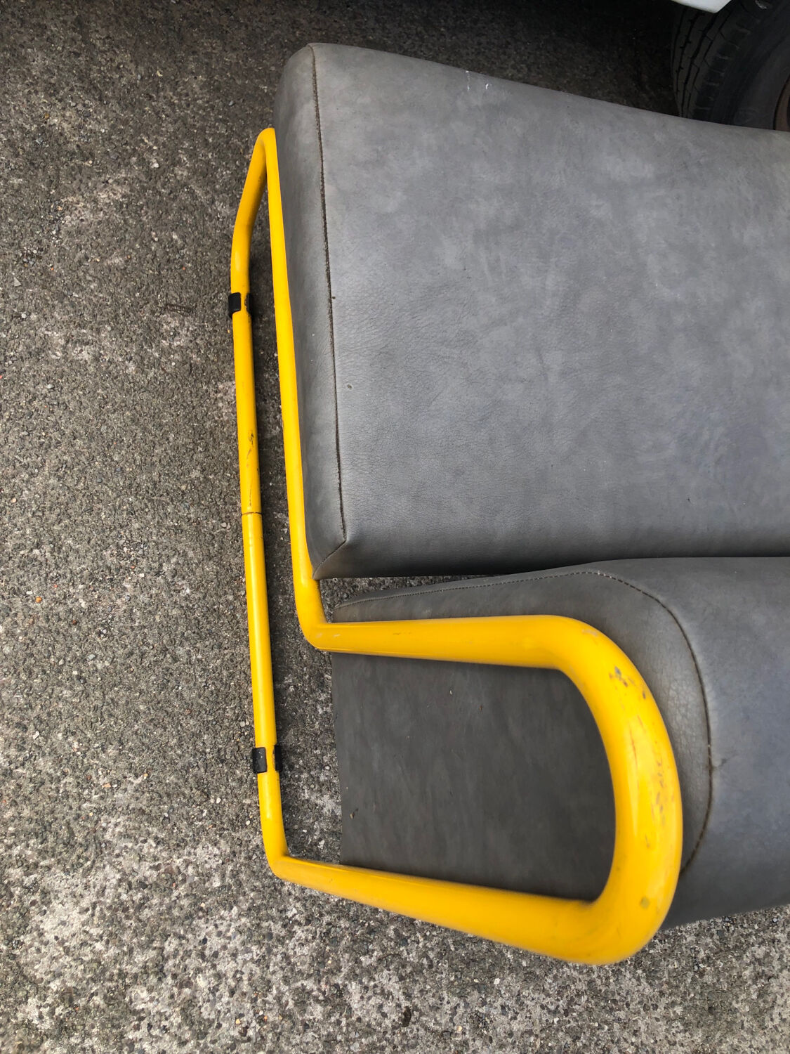 Pair of designer armchairs by Henri Julien