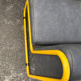 Pair of designer armchairs by Henri Julien