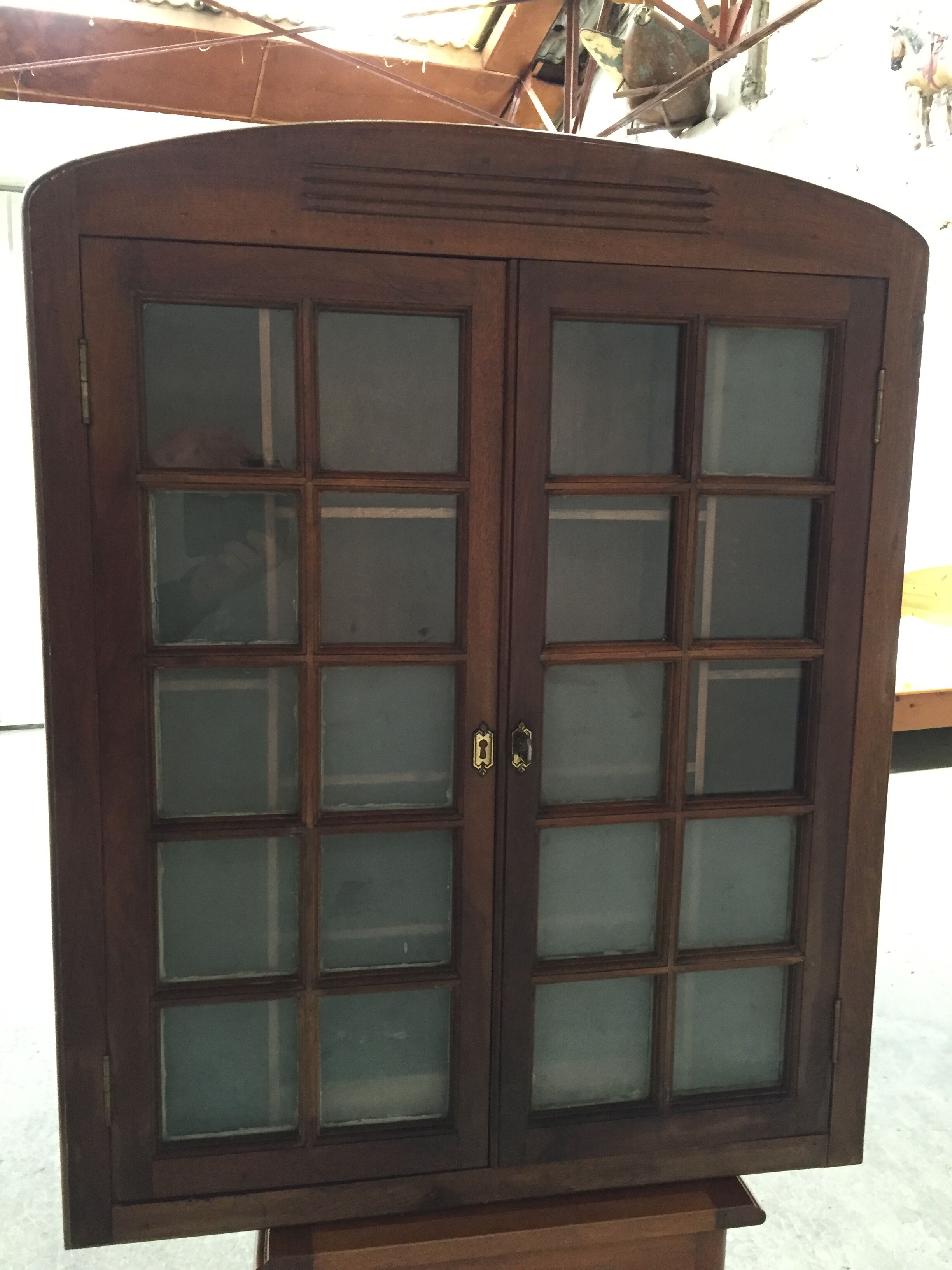 Old wall case has pharmacy