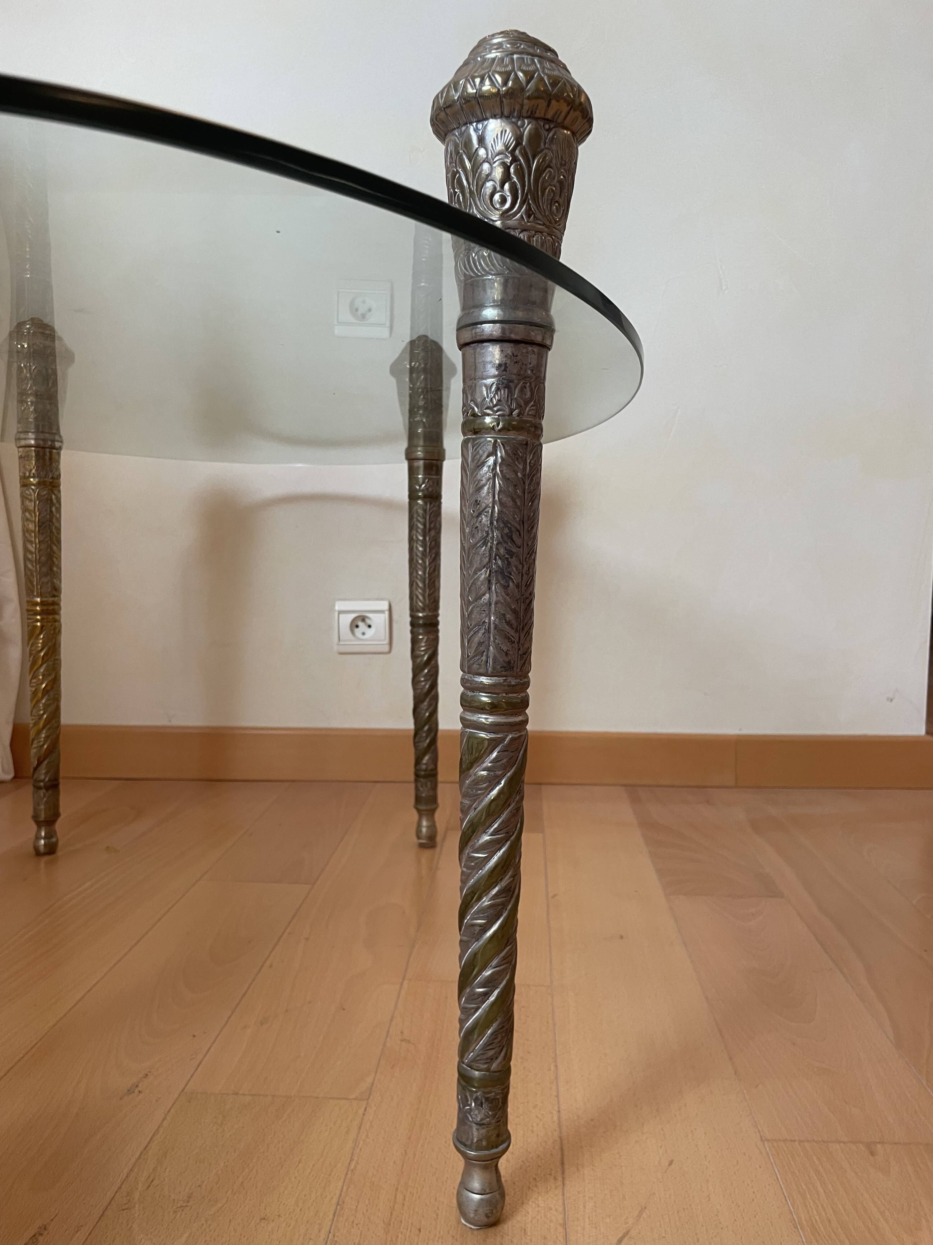 Glass coffee table with metal legs