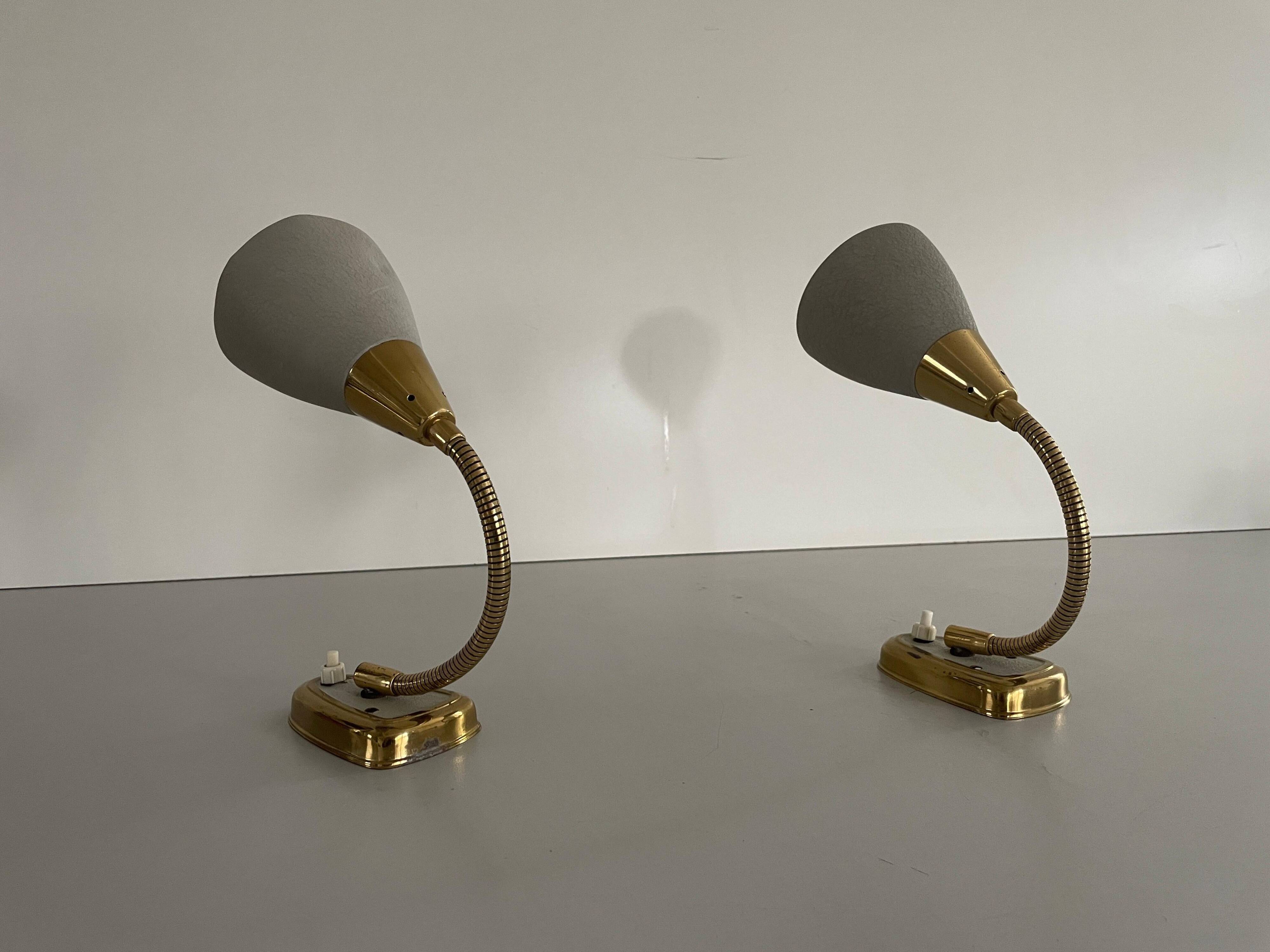 Pair of grey metal and brass wall lights, 1960s, Germany