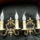 Pair of bronze double-arm appliques