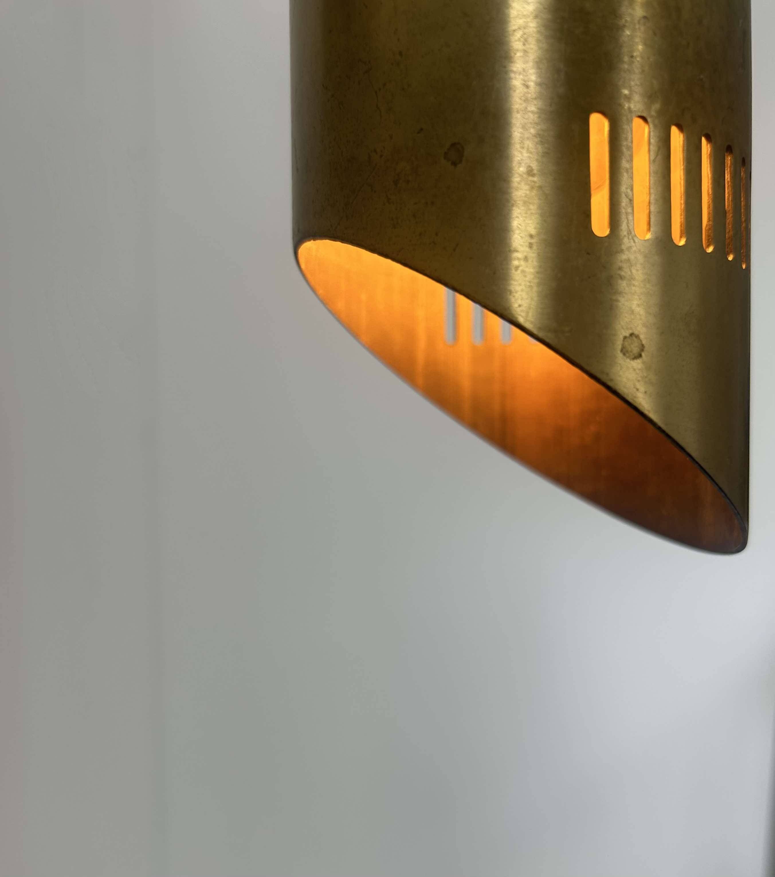 Vintage adjustable wall light, solid perforated brass, France 1960