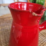 Ancient pitcher in red enamelled sandstone