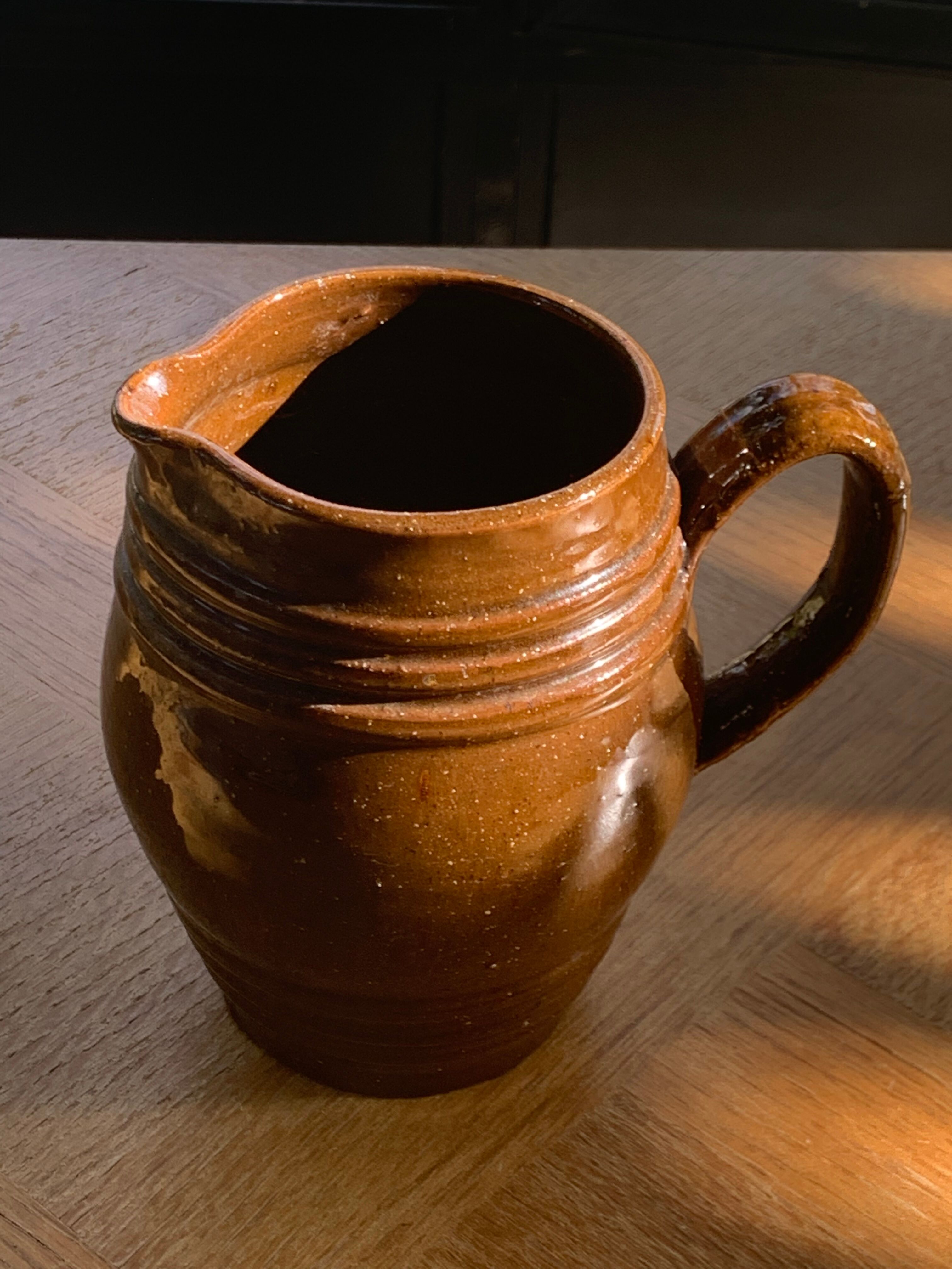 Pitcher old cider jug in glazed sandstone