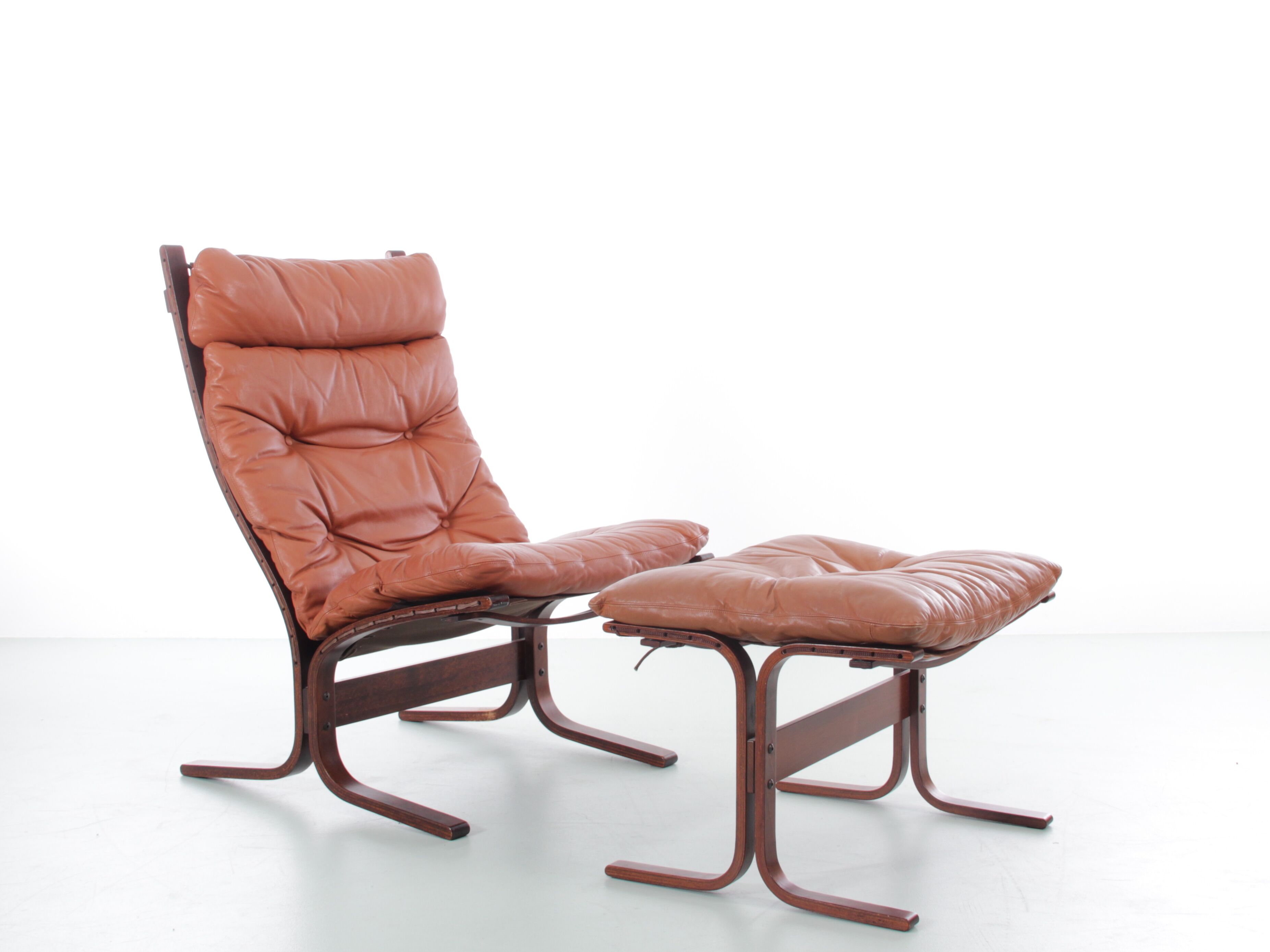 Scandinavian chair model Siesta, high back and foot rests