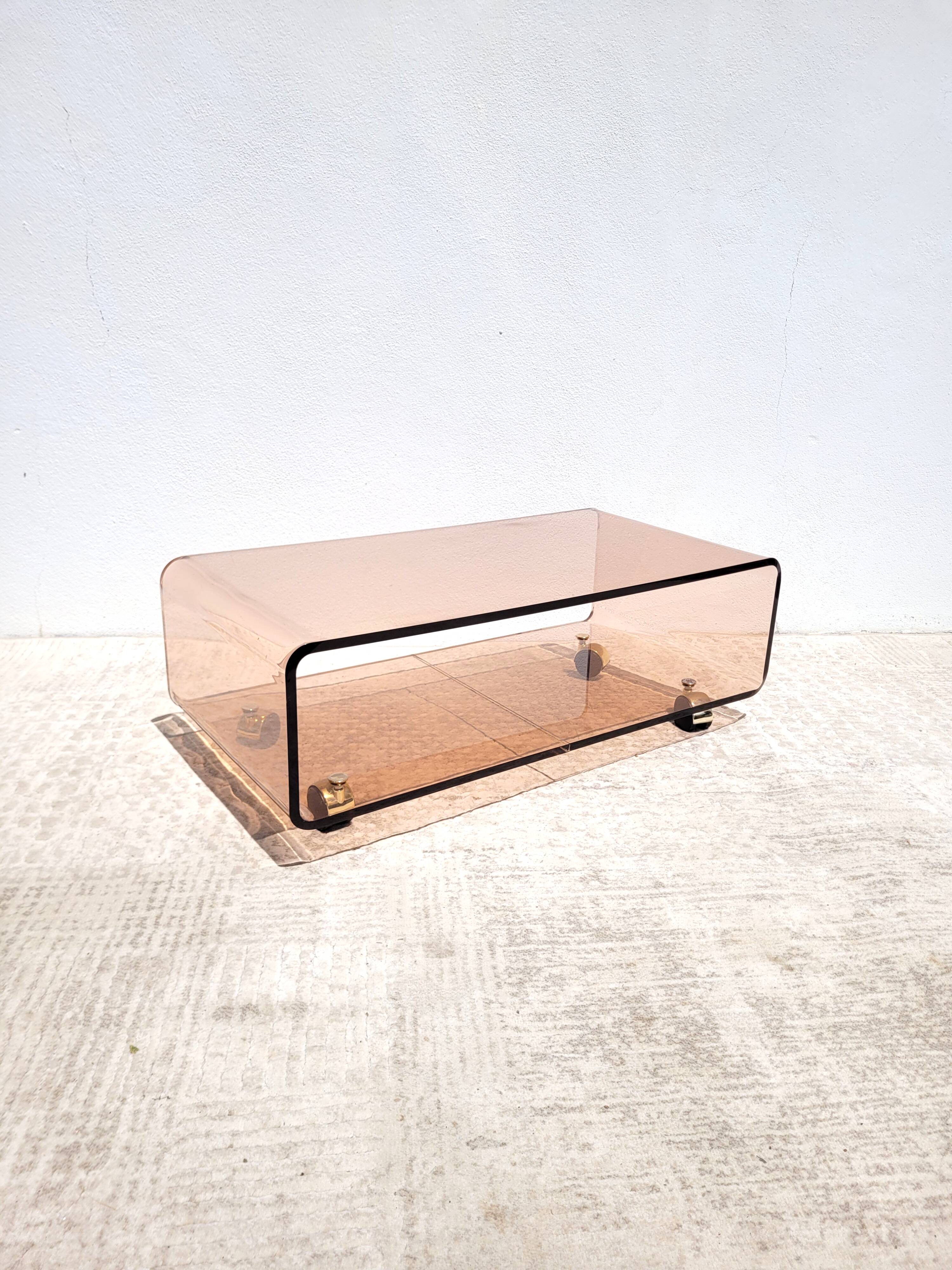 Vintage plexiglass coffee table with wheels 1970