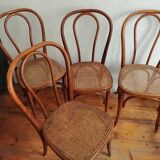 Series of 4 cane bistro chairs