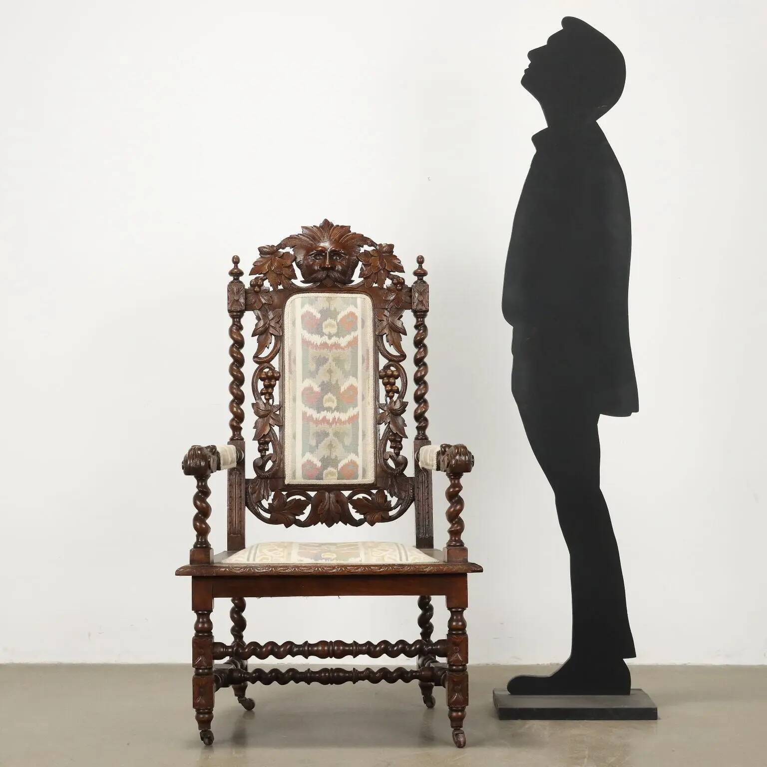 Antique Neo-Renaissance armchair in oak and fabric, 19th-20th century.