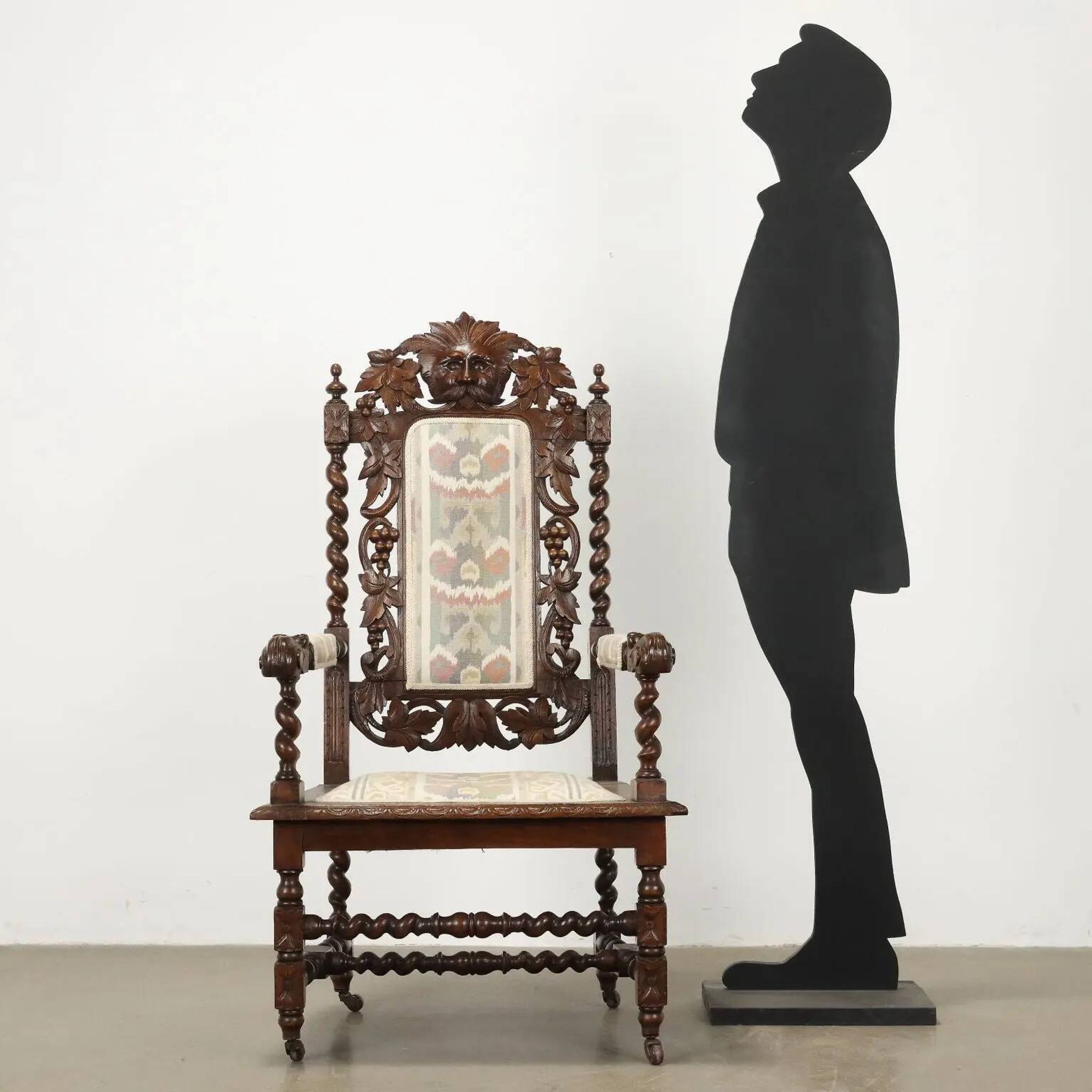 Antique Neo-Renaissance armchair in oak and fabric, 19th-20th century.