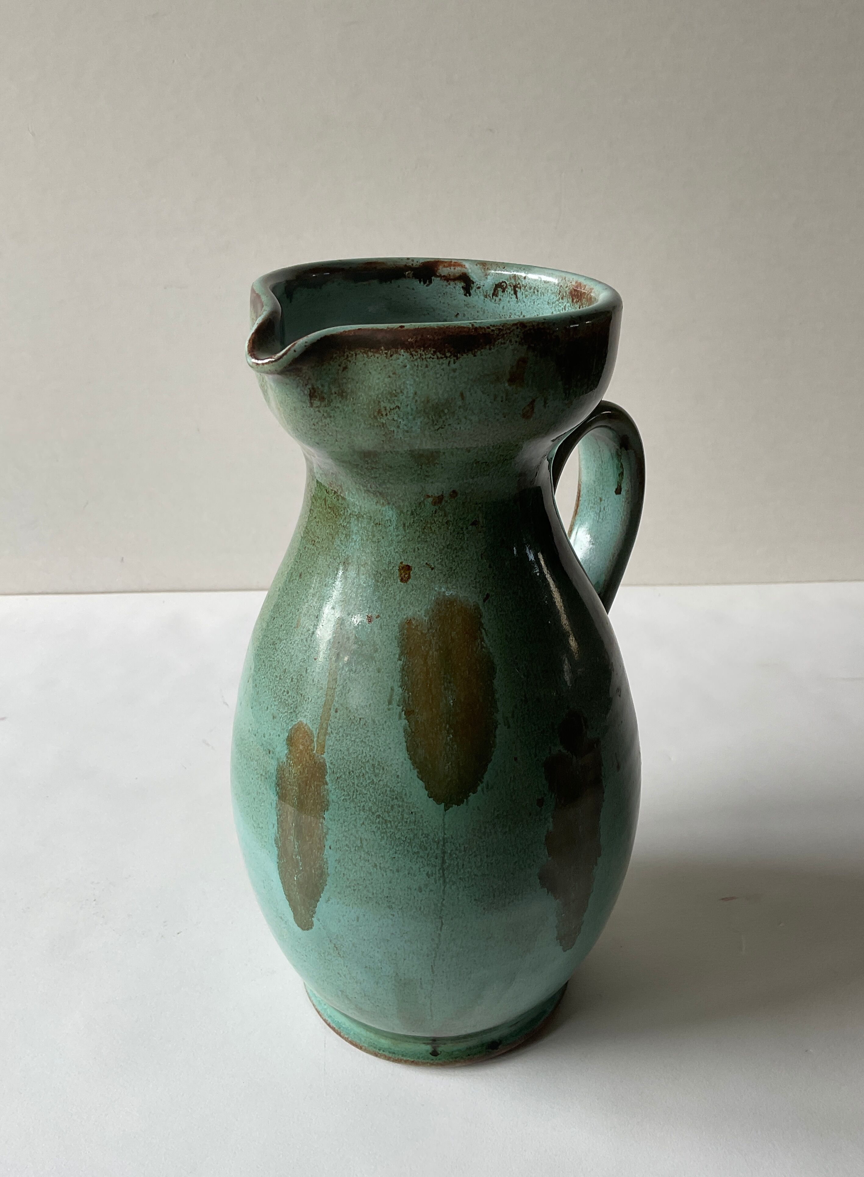 Vintage celadon ceramic pitcher