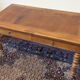 Cherry wood desk with a leather top.