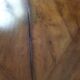 Antique half-moon walnut round table