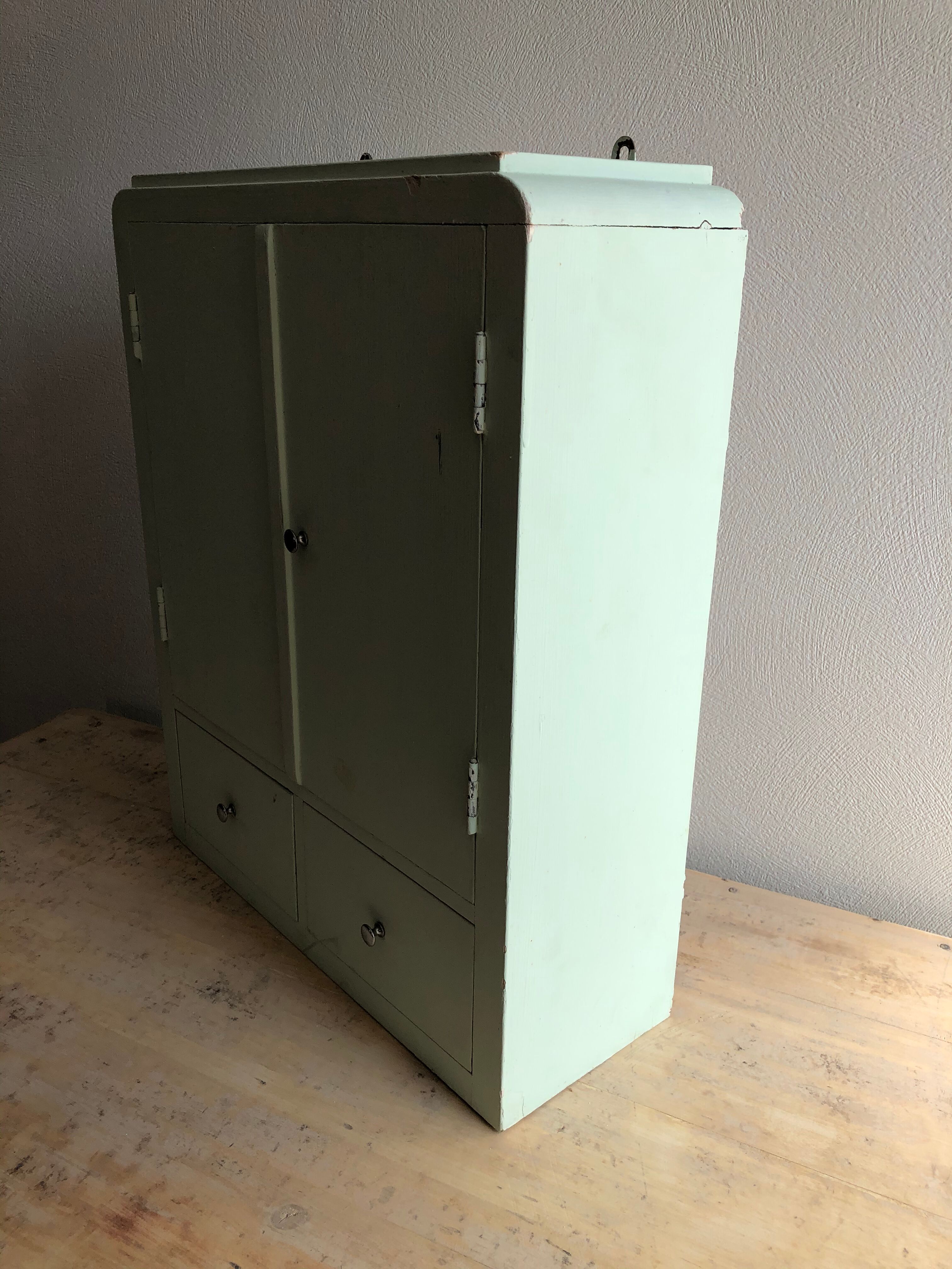 Patinated medicine cabinet